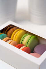 Macaroons in a package. colorful French macaroons. Gift for March 8, Valentine's Day.