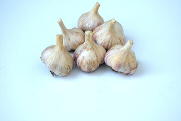 isolated garlic, close-up as texture for background