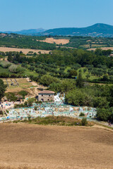 The gorgeous natural thermal bath of Saturnia. Warm water spills out of the rock creating a waterfall with spontaneous ponds, the "Cascate del Molino" in Tuscany, Italy