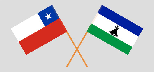 Crossed flags of Chile and the Kingdom of Lesotho. Official colors. Correct proportion