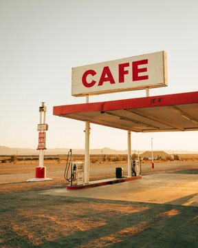 Gas station with cafe sign, on Route 66 in the Mojave Desert of California