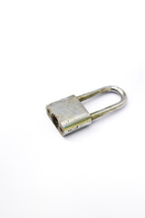 Old used padlock isolated on white background