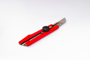 Red Cutter Knife isolated on white background. stock photo.