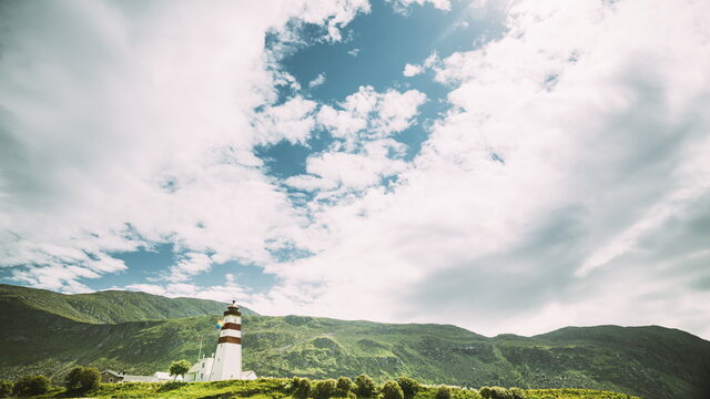 Alnesgard, Godoya, Norway. Old Alnes Lighthouse In Summer Day In Godoy Island Near Alesund Town. Alnes Fyr