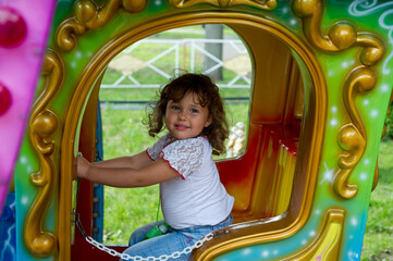 girl on carousel