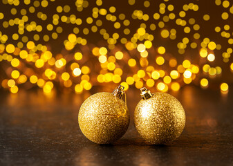 Christmas decorations. Christmas balls on a dark background with bokeh. Selected sharpness