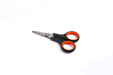 Black Orange used scissors isolated on white background