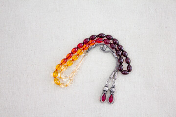 Rosary.Yellow and red rosary used by the Turks,isolated on white background