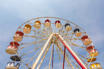 Colorful giant wheels in park amusement