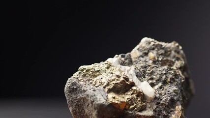 Gold ore, raw mineral stone close up, mining industry value. Can be used to represent a gold mine, fortune, luxury or mineralogy