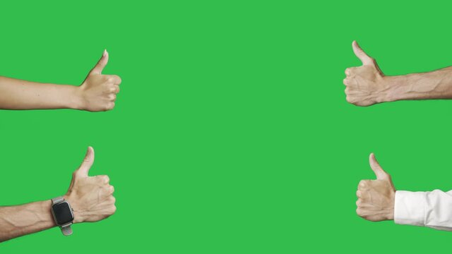 Closeup hands of people are showing a class with a thumbs up on a green screen background. Human gestures. Concept of winner or success and approval or praise. Chroma key. Copy space text. Isolated