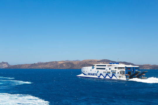 Seajets cruise boats is  in Greece  in sea on background mountains. Nearly island Santorini