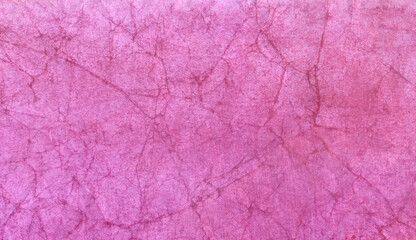 Crumpled paper with bright pink color.
