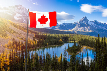 Canadian National Flag Composite with Canadian Rocky Mountains in Background. Sunny Fall Day. Located in Lake O'Hara, Yoho National Park, British Columbia, Canada.
