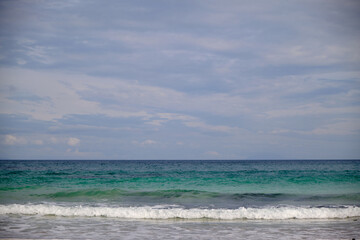 Peaceful Waves Breaking on a Beach in Coastal Japan