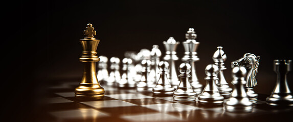 Close up king chess challenge battle fighting with other chess team on chess board concepts of leadership and strategy or strategic plan and human resource or risk management or business team player.