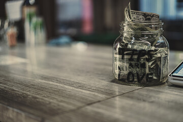 Tip jar waiting for more money