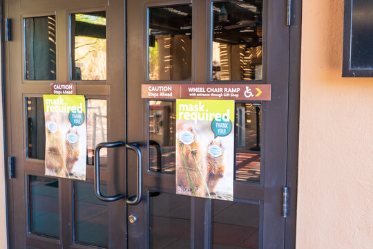 Mask Required Sign On Door To Gift Shop At Desert Museum In Tucson, Arizona.