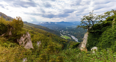 Travel along the mountain range and plateau in a picturesque area, on a summer day, communication with nature, a tourist quest.