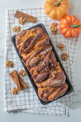 Sweet home made pumpkin cinnamon babka on a table