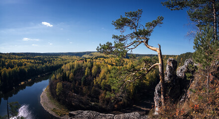 Fototapeta premium Chusovaya River with rocky shores in autumn, Ural, Russia