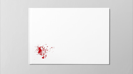 Red ink splash on white paper on white table with space for copy space
