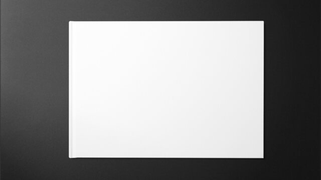 White sketch book on green background with copy space free image
