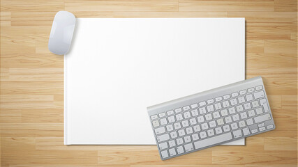 keyboard and mouse over the white paper for copy space on the wooden table 