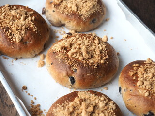 Sweet bread bun with crumble topping