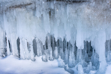 Gremyachinsk, Lake Baikal, Russia February 10, 2019 Ice build-ups (stalactites) in an ice cave on Lake Baikal.