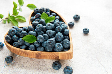 Blueberries on concrete background