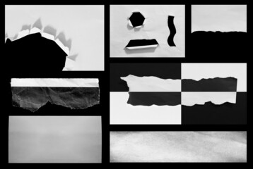 Set of piece torn paper on black. Copy space.