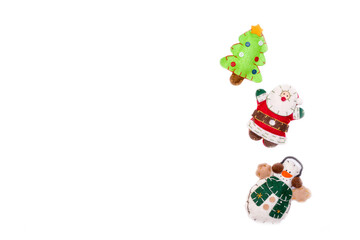 Flat lay santa claus, snowman, felt Christmas toys isolate on a white background. Christmas and New Year concept, place under the text