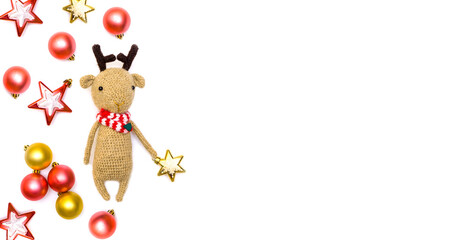 Reindeer Christmas decor toys balls stars Free for text Poster Banner. Flat lay Christmas new year