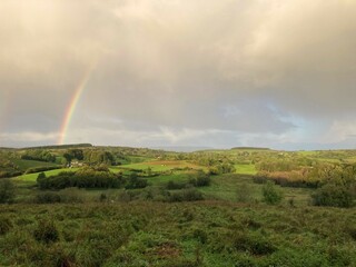 Naklejka na ściany i meble Rainbow over countryside landscape, Co. Roscommon, Ireland