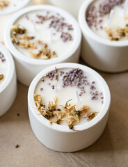 Hand-made concrete candles with dried flowers, scented soy wax vegan candles