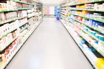 Market shop or supermarket interior as blurred store background