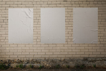White crumpled paper poster template. Glued paper banner mockup. Empty street art mockup. Clear...