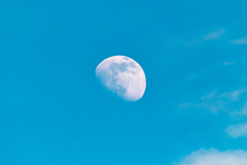 Moon on the blue sky during the day in Ireland