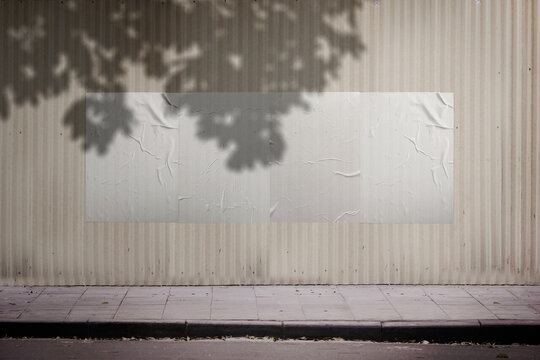 White crumpled paper poster template. Glued paper banner mockup. Empty street art mockup. Clear urban glued advertising on wall background