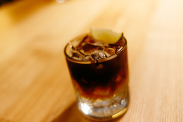 glass of cola with ice
