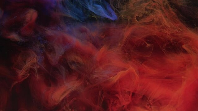 Color smoke background. Fire flame. Hot cold pigment animation. Burning smoke air explosion. Ink water flow. Red blue fume cloud motion on dark abstract background for intro.
