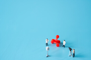 miniature figure doctor investigation red virus for covid-19 corona vaccine health andJournalists...