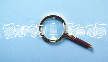 Magnifying glass with a documents on the blue background.