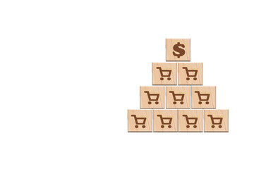 Wooden blocks with a cart icon, increased sales volume, and business growth Online shopping to a wood cart on the background and in the area, increased sales volume leads to business success, and the 