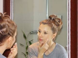 Applying the cream..Magic anti-aging cream.