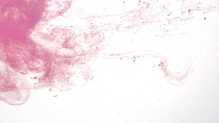 Pink watercolor ink in water on a white background. Colored acrylic paints in water. Pink cloud of ink on a white background. Awesome abstract background.