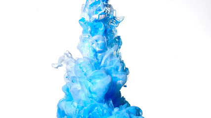 Colored cloud of ink on a white background. Blue and white watercolor ink in water on a white...
