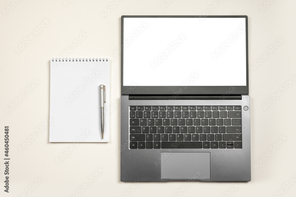 Poster minimal workplace mockup with laptop and blank notepad on white isolated background. top view. flat 