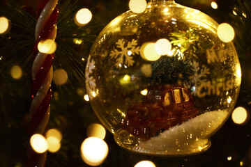 Glass ball ornament in christmas tree